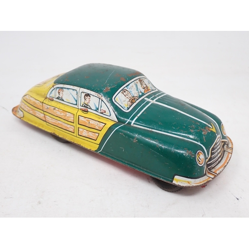 211 - A Louis Marx & Co. friction driven tinplate Car