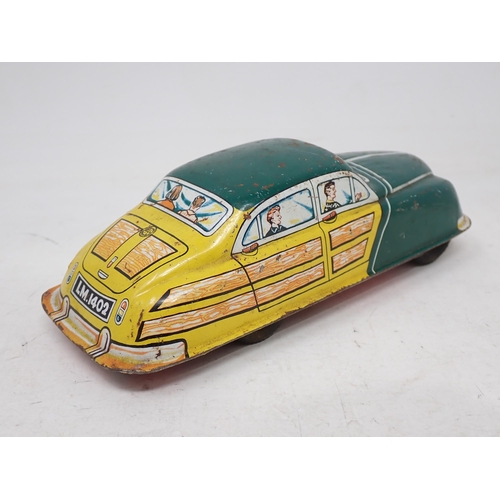 211 - A Louis Marx & Co. friction driven tinplate Car