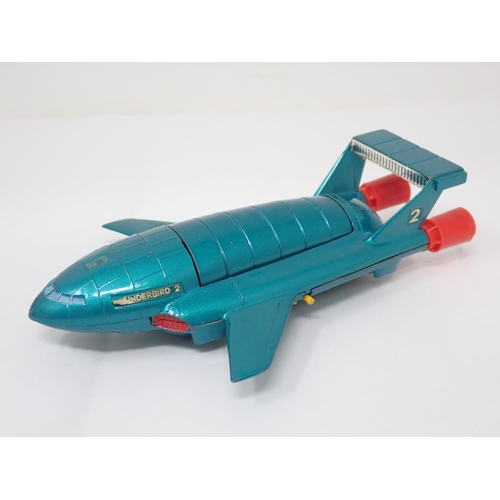 227 - A boxed Dinky Toys Thunderbirds 2 complete with Thunderbirds 2, slight tears to box and biro price, ... 