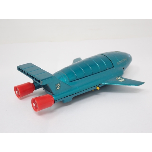 227 - A boxed Dinky Toys Thunderbirds 2 complete with Thunderbirds 2, slight tears to box and biro price, ... 