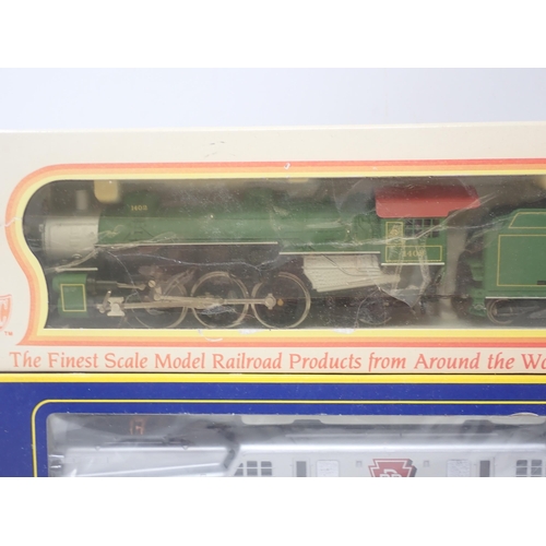 607 - A boxed IHC HO scale American Southern 4-6-2 Locomotive and an AHM G.C.1 Pennsylvania electric Locom... 