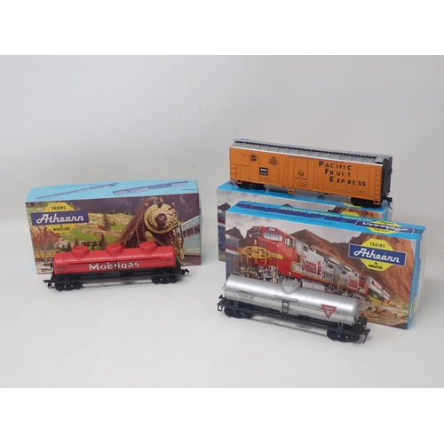 610 - Five boxed IHC HO scale Coaches and seven boxed Athearn Wagons