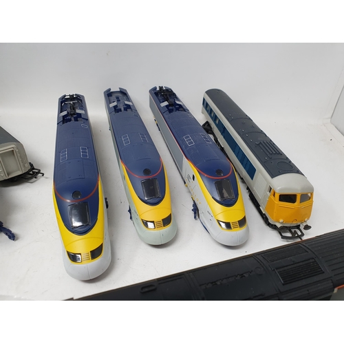 614 - A Hornby 00 gauge Eurostar Set with spare dummy trailer, a Triang BR Pullman Set and a Hornby Virgin... 