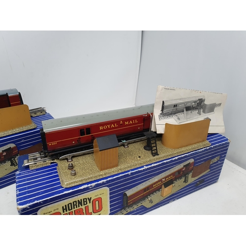 676 - Three boxed Hornby Dublo 3-rail T.P.O Mail Van Sets