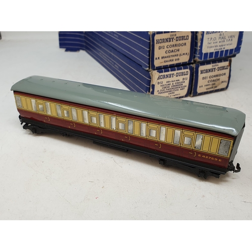 724 - Fifteen boxed and part boxed Hornby Dublo 3-rail Coaches including D1 T.P.O. Mail Van