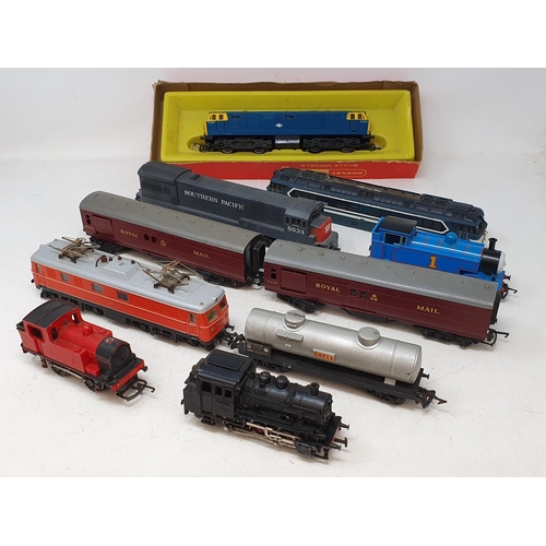 735 - A box of mainly play worn Triang, Kleinbahn, Trix and other HO and 00 gauge Locomotives and Rolling ... 