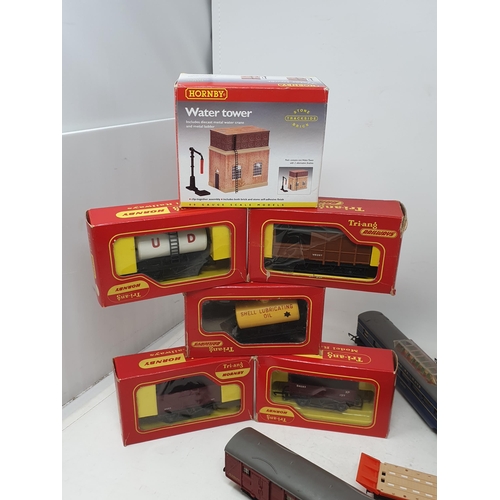 748 - Box of boxed and unboxed Triang 00 and HO Rolling Stock