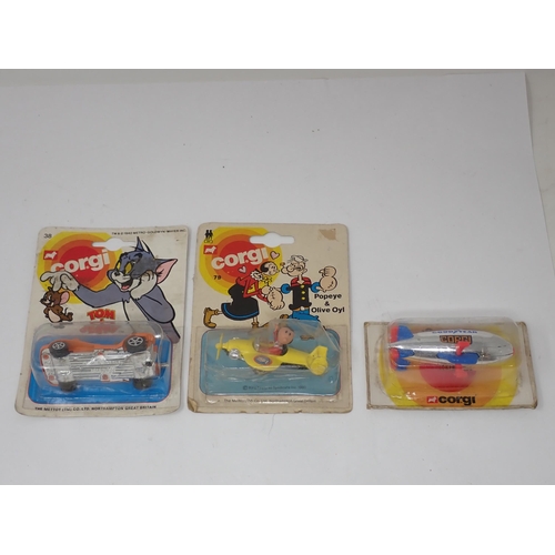 75 - A Corgi No.38 Tom & Jerry, a No.79 Popeye & Olive Oyl and a Good Year Air Balloon, all original pack... 