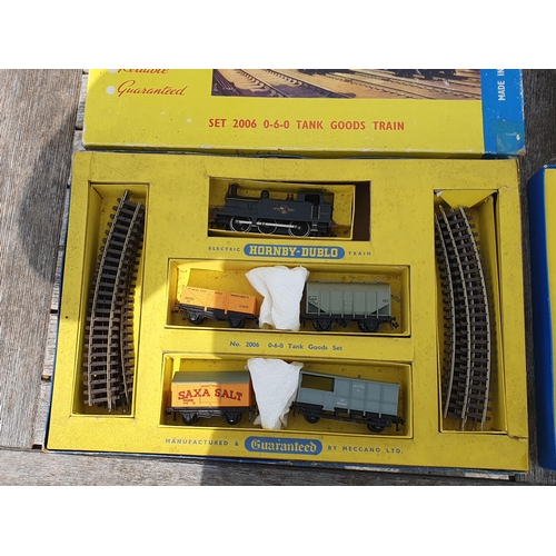 750 - Three Hornby Dublo 2-rail Sets, boxes damaged and contents incomplete