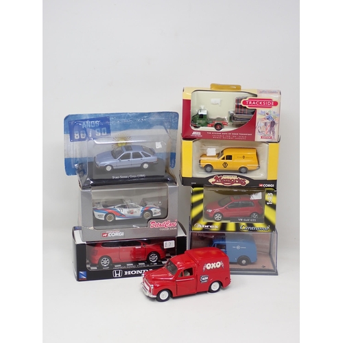 90 - A box of modern boxed diecast Models including Lledo Thrust Super Sonic Car, Batman Forever Set, Cor... 