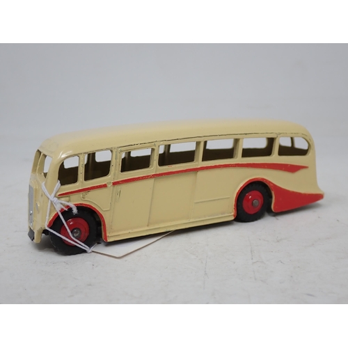 17 - Dinky Toys No.281 Luxury Coach, cream with red flash and hubs. Mint condition, ideal scale for the l... 