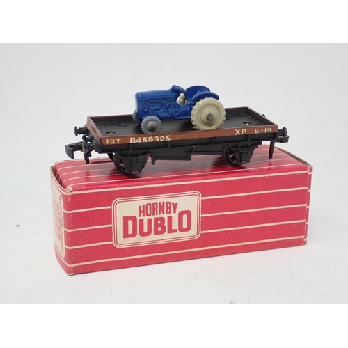 31 - Hornby Dublo 4649 Low-sided Wagon with Tractor, boxed, rarer version with the beige rear wheels inst... 