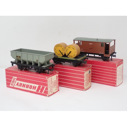 33 - Three Hornby Dublo Wagons including 4644 Hopper Wagon, 4646 Low-sided Wagons with aluminium cable dr... 