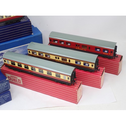 49 - Mixed collection of nine boxed Hornby Dublo items to include rare 4005 1/2nd Coach, unused and in mi... 