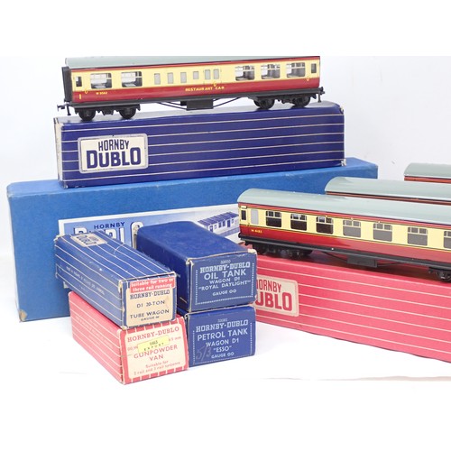 49 - Mixed collection of nine boxed Hornby Dublo items to include rare 4005 1/2nd Coach, unused and in mi... 