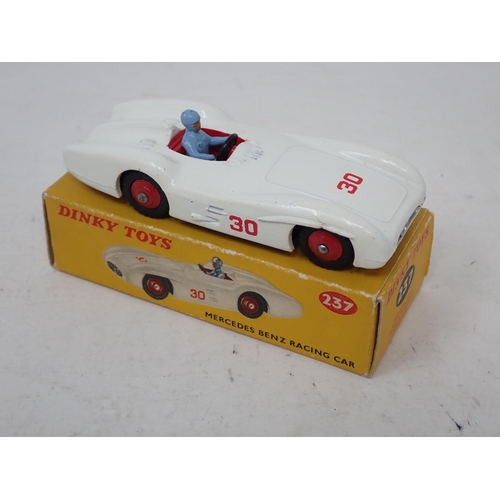 189 - Dinky Toys 237 Mercedes Benz Racing Car with red and blue driver, boxed