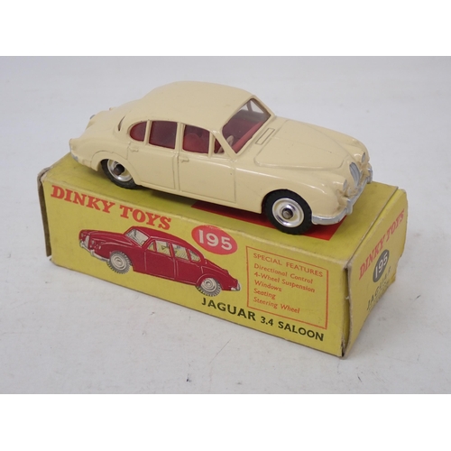 212 - Dinky Toys 195 cream Jaguar 3.4L Saloon, boxed