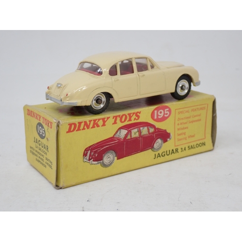 212 - Dinky Toys 195 cream Jaguar 3.4L Saloon, boxed