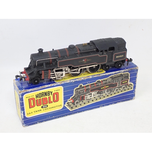 254 - Two scarce Hornby Dublo Locomotives, 3218 2-6-4T, VG, emblems slightly dull, box fair but complete; ... 