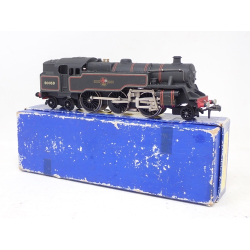 254 - Two scarce Hornby Dublo Locomotives, 3218 2-6-4T, VG, emblems slightly dull, box fair but complete; ... 