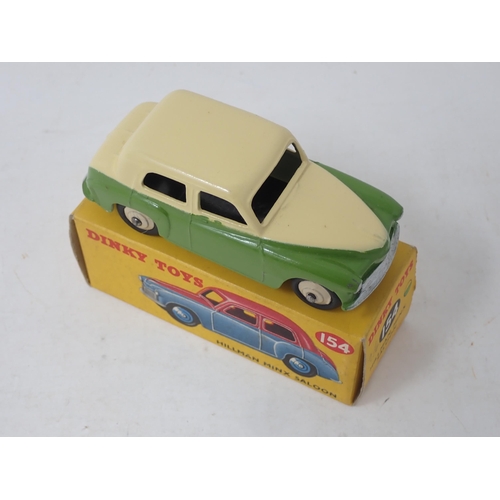 287 - Dinky Toys 154 Hillman Minx Saloon in cream and green, boxed