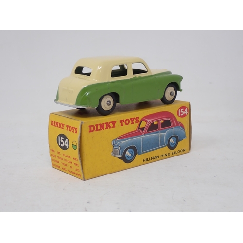 287 - Dinky Toys 154 Hillman Minx Saloon in cream and green, boxed