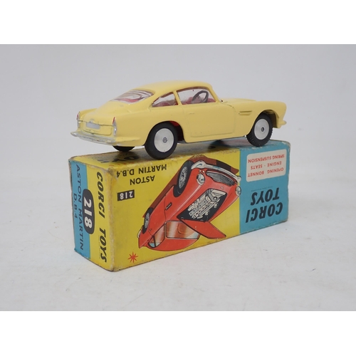 300 - Corgi Toys 218 yellow Aston Martin DB4, boxed