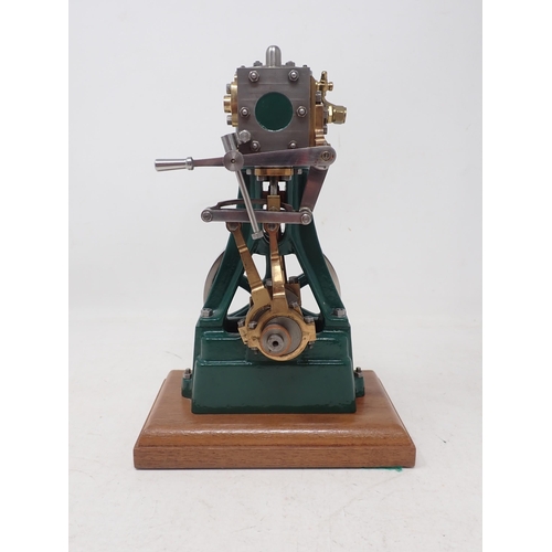 304 - A Stuart Turner No.4 Vertical Engine Model on wooden plinth, finished to a high standard 8 1/2in H o... 