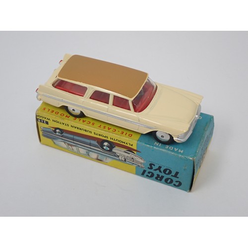 326 - Corgi Toys 219 cream Plymouth Suburban Station Wagon, boxed