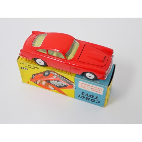 337 - Corgi Toys 218 red Aston Martin DB4, boxed