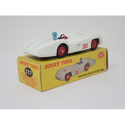 352 - Dinky Toys 237 Mercedes Benz Racing Car with red plastic hubs and blue driver, boxed