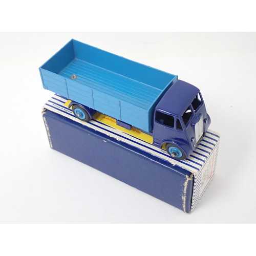 356 - Dinky Toys 911 Guy 4-ton Lorry with dark blue cab and pale blue back, boxed