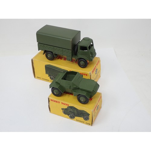 377 - Dinky Toys 623 Army Covered Wagon, 670 Armoured Car, 673 Scout Car and 692 5.5 Medium Gun, boxed