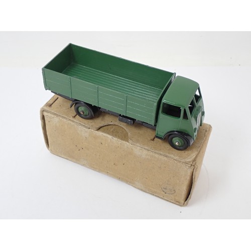 399 - Dinky Toys 511 Guy 4-ton Lorry with green back and black chassis, boxed