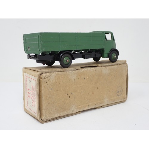 399 - Dinky Toys 511 Guy 4-ton Lorry with green back and black chassis, boxed