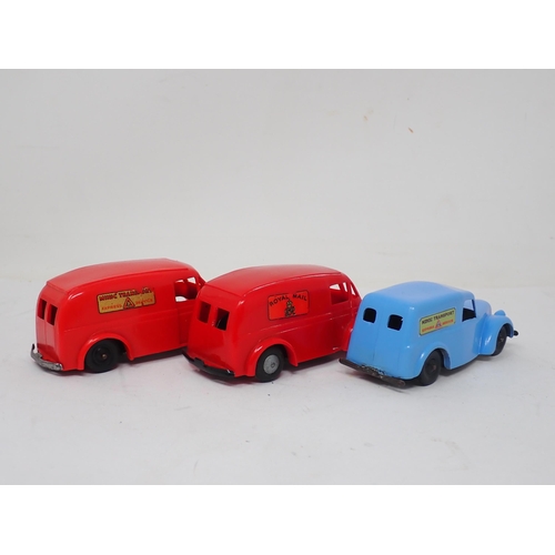 449 - A Triang Minic clockwork Royal Mail Van, a red Transport Van and a blue Van