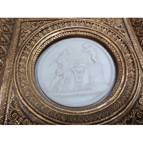 642 - A pair of gilt framed circular parian Plaques, 5 1/2in diam and gilt framed print