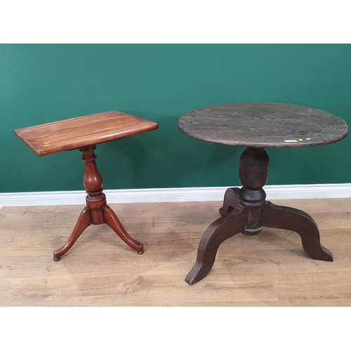 65 - A mixed wood Circular Tripod Table 2ft 6