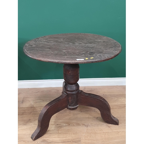 65 - A mixed wood Circular Tripod Table 2ft 6