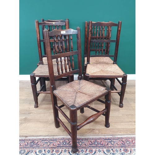 79 - A set of five ash and elm Spindle Back rush seated Chairs A/F.