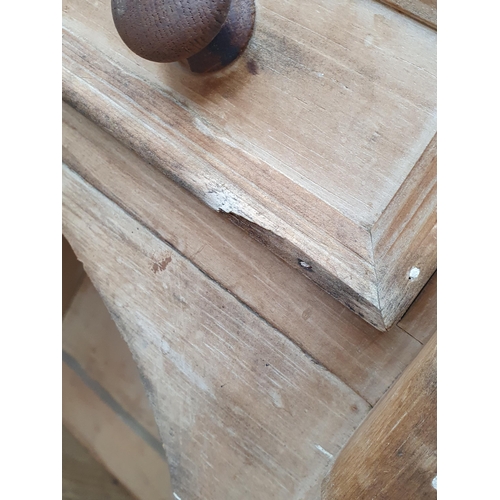 98 - A Victorian pine Kneehole Desk with raised and shaped gallery, above three fitted drawers above pair... 