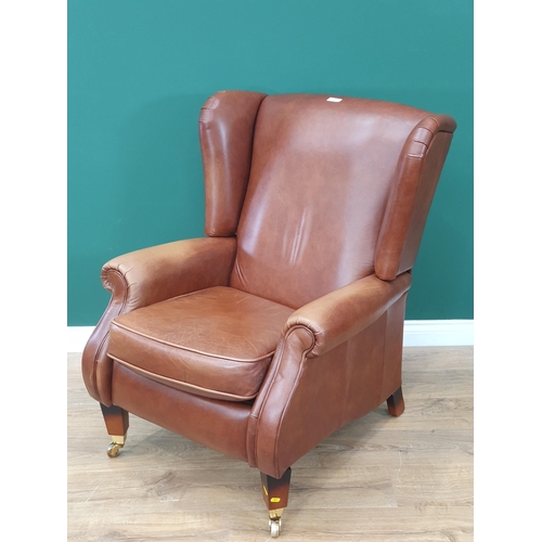 99 - A Parker Knoll Wing Back Recliner Armchair.