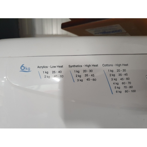 603 - A Hotpoint Aquarius VTD00 Tumble Dryer.