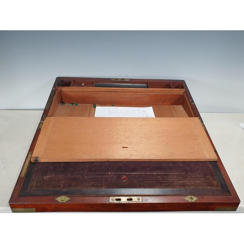 650 - A Victorian Mahogany and brass inlaid military writing slope, fitted secret drawers, 20in wide, 7in ... 