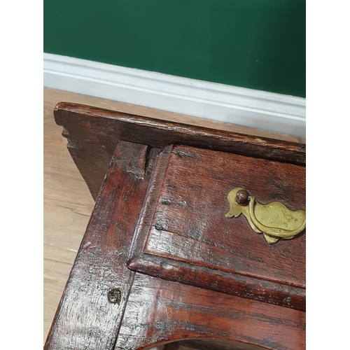 1 - An 18th Century oak Side Table, with single fitted drawer, above shaped frieze on turned supports wi... 