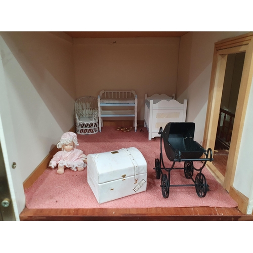 215 - A white painted Dolls House with assorted Furniture and accessories, 2ft 8