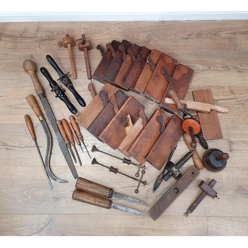 216 - A quantity of Vintage Moulding Planes, a Stanley Hand Drill, Chisels, and other Vintage Tools.