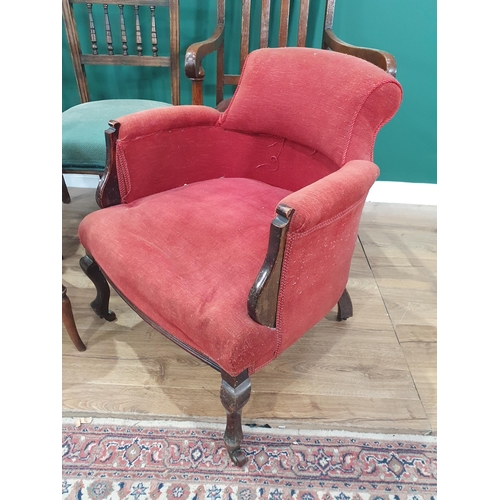 27 - Two oak Carvers with upholstered seats, two single Chairs a red upholstered Elbow Chair and a floral... 