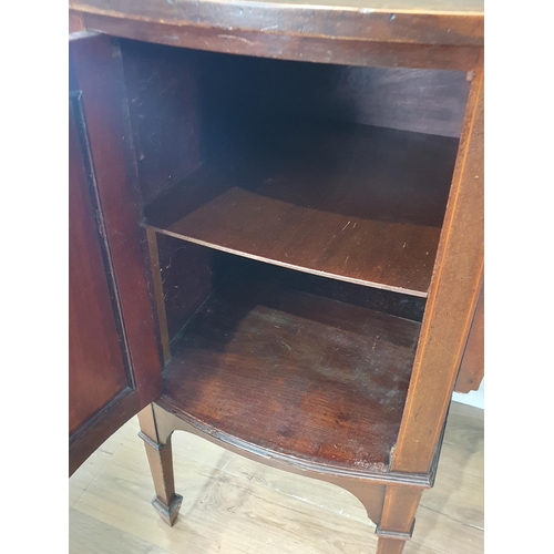 28 - A mahogany and inlaid Sideboard with single fitted drawer, flanked by pair of cupboard doors with li... 