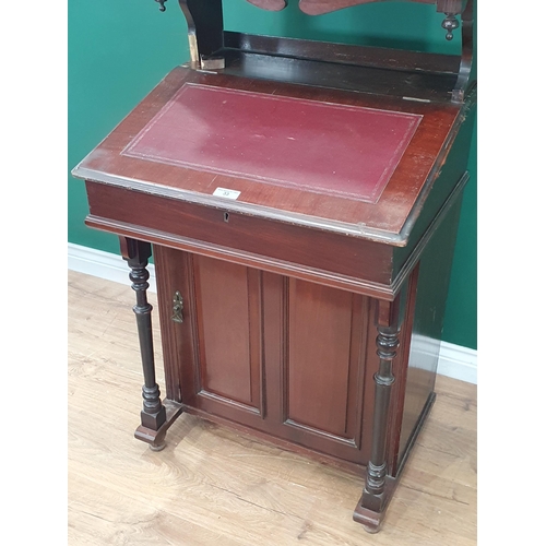 33 - A mahogany Davenport with Cabinet, the cabinet with glazed door above lift up writing surface, with ... 